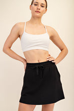 Load image into Gallery viewer, Stay A While Poly Span Skort in Black