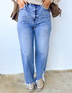 The Aftermath Distressed Hem Straight Leg Jeans in Denim Blue