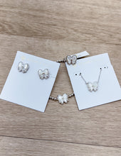 Load image into Gallery viewer, Kendra Scott Haley Bow Short Pendant Necklace in Silver/Ivory MOP